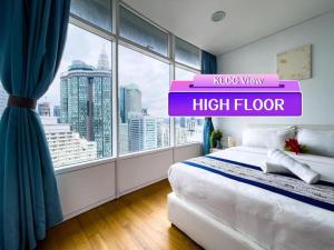vortex suites klcc by twin tower vibes客房内的一张或多张床位