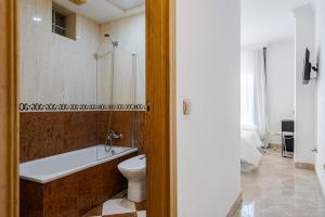 Kúpeľňa v ubytovaní Hotel Agur