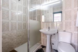 Kúpeľňa v ubytovaní Hotel Agur