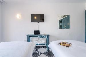 Posteľ alebo postele v izbe v ubytovaní Hotel Agur