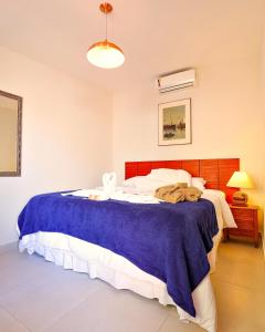 Un ou plusieurs lits dans un hébergement de l'établissement Inn House Santa Teresa