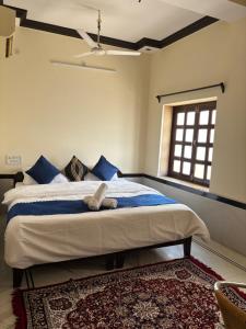 Voodi või voodid majutusasutuse Hotel Jaisalmer Plaza toas