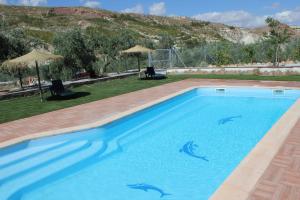 Swimmingpoolen hos eller tæt på Hotel Rural Valle del Turrilla - Cazorlatur