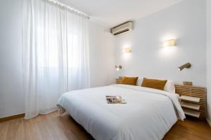 Posteľ alebo postele v izbe v ubytovaní Hotel Agur