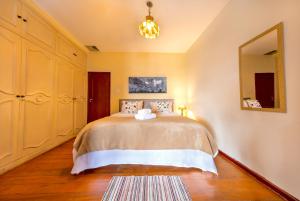 Un ou plusieurs lits dans un hébergement de l'établissement Inn House Santa Teresa