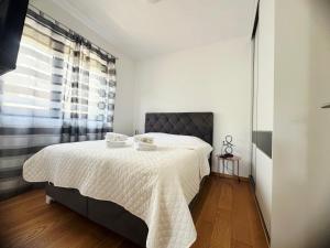 SeaWolf Apartment客房内的一张或多张床位