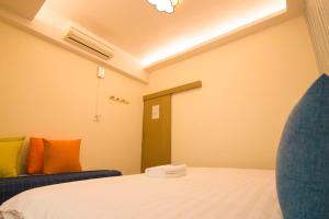 Letto o letti in una camera di One Heart Inn