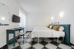 Posteľ alebo postele v izbe v ubytovaní Hotel Agur