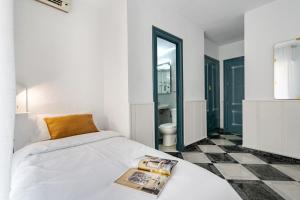 Posteľ alebo postele v izbe v ubytovaní Hotel Agur