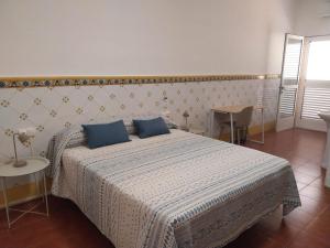 Giường trong phòng chung tại Casa Santa Úrsula