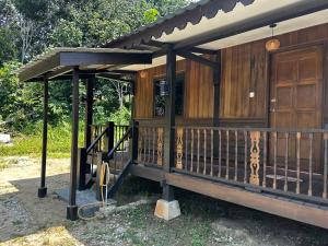 Μπαλκόνι ή βεράντα στο Homestay Mentakab Suasana Desa +7 φωτογραφίες