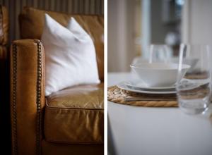 two pictures of a chair and a table with a bowl at The Granville 4 bedroom house sleeps 7 in York