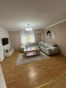 a living room with a couch and a coffee table at Villa Pliva Oasis in Jezero +10 photos