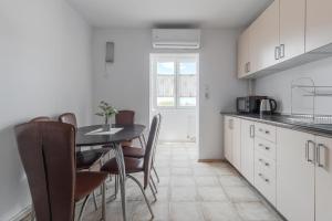 Kuchyň nebo kuchyňský kout v ubytování Home Guest - Apartment 7 + 11 fotografií