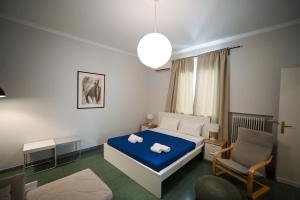 Letto o letti in una camera di Athenian Suite by Zeussuites