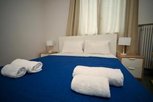 Letto o letti in una camera di Athenian Suite by Zeussuites