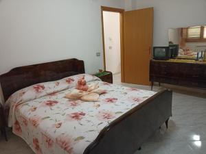 Postel nebo postele na pokoji v ubytování B&B Bonvino