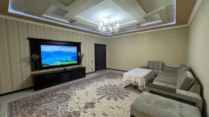 TV a/nebo společenská místnost v ubytování Прекрасное место для отдыха - Регистан