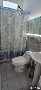 Et badeværelse på Tu refugio a pasos del centro comercial