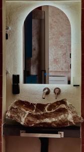 En eller flere senge i et værelse på Odeon Neapolis