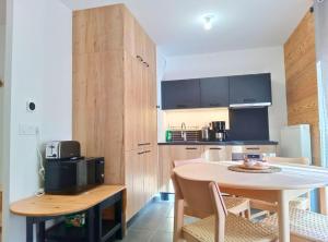 Kuchyň nebo kuchyňský kout v ubytování Le Cabri - Charmant T2 au pied des pistes