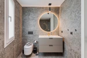 Et badeværelse på Penthouse 9 + 17 billeder