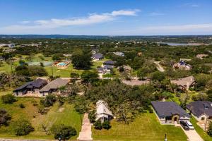 an aerial view of a house at The Cozy Corner in Windermere Oaks on Lake Travis in Spicewood