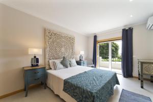 Ένα ή περισσότερα κρεβάτια σε δωμάτιο στο Gale Coast Villa +42 φωτογραφίες