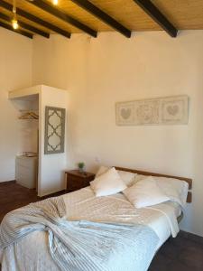 En eller flere senge i et værelse på El cerro