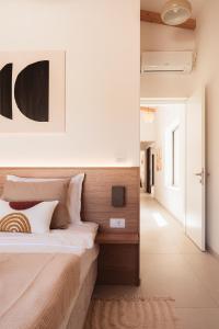a bedroom with a large bed and a hallway at Villa Vicenta in Svetvinčenat +33 photos