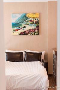 Voodi või voodid majutusasutuse My Resort by Tatee Huahin E101 toas