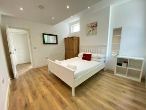 Katil atau katil-katil dalam bilik di Cosy Coombe Retreat