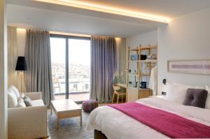 מיטה או מיטות בחדר ב-Coco-Mat Hotel Athens