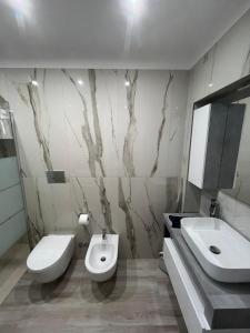 Ένα μπάνιο στο South Blue Apartment