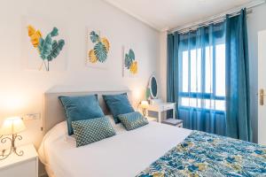Ένα ή περισσότερα κρεβάτια σε δωμάτιο στο Superbe appartement calme vue mer