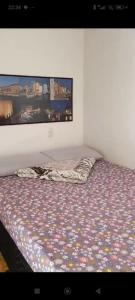 Ένα ή περισσότερα κρεβάτια σε δωμάτιο στο ESPAÇO Casa D' Praia