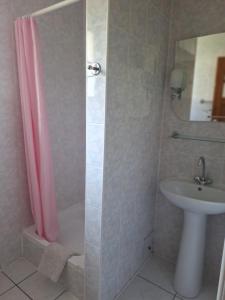 a bathroom with a shower and a sink at pokoje STIFADO in Międzyzdroje +20 photos
