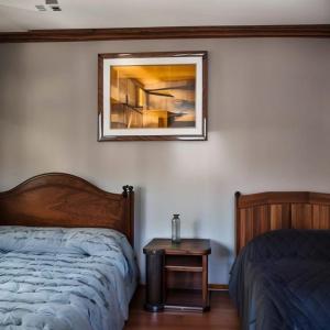 Кровать или кровати в номере Hotel Plaza del Valle