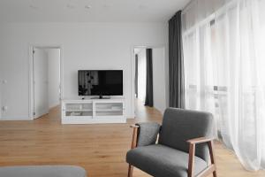 Et tv og/eller underholdning på Perfect Moments Apartments, Šventoji