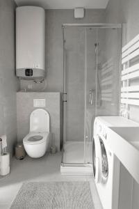 Et badeværelse på Perfect Moments Apartments, Šventoji