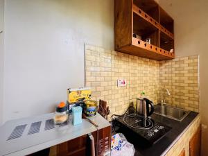 Kuchyň nebo kuchyňský kout v ubytování The Haven Loft