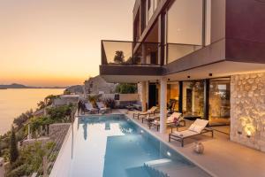 an image of a house with a swimming pool at Villa Atreeum in Dubrovnik