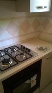 A kitchen or kitchenette at Le Querce Santa Cesarea Terme