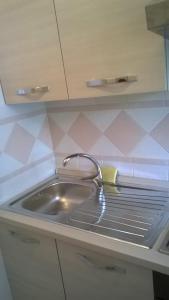 A kitchen or kitchenette at Le Querce Santa Cesarea Terme