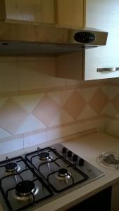 A kitchen or kitchenette at Le Querce Santa Cesarea Terme
