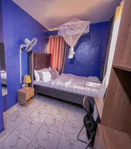 Ένα ή περισσότερα κρεβάτια σε δωμάτιο στο ZaiLux Homes