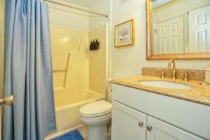 Koupelna v ubytování House of Waves + 29 fotografií