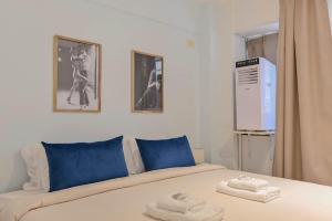 Postel nebo postele na pokoji v ubytování MOT Mansion Mitre 'D' - 4 pax Gym & Jacuzzi