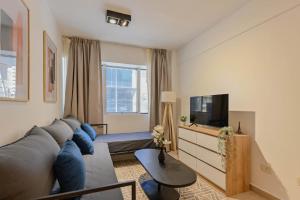 TV a/nebo společenská místnost v ubytování MOT Mansion Mitre 'D' - 4 pax Gym & Jacuzzi + 10 fotografií