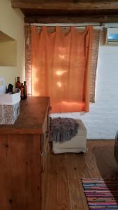 Postel nebo postele na pokoji v ubytování Casa de Montaña, Lujan de Cuyo zona de bodegas